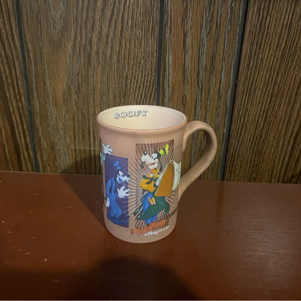 Goofy Official Walt Disney World Mug Tan Animation Collage Drawing Coffee Brown